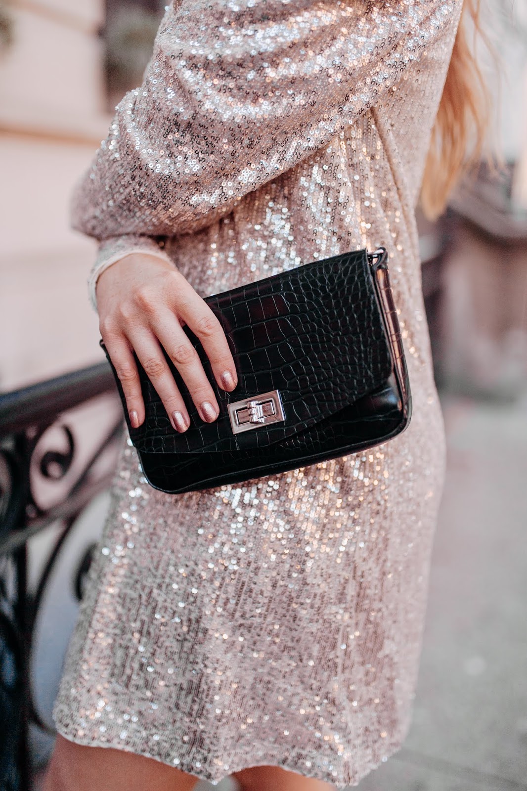 Holiday Party Dresses and Christmas Outfit Ideas - Affordable by Amanda wears a sequined silver dress from H&M in New York City