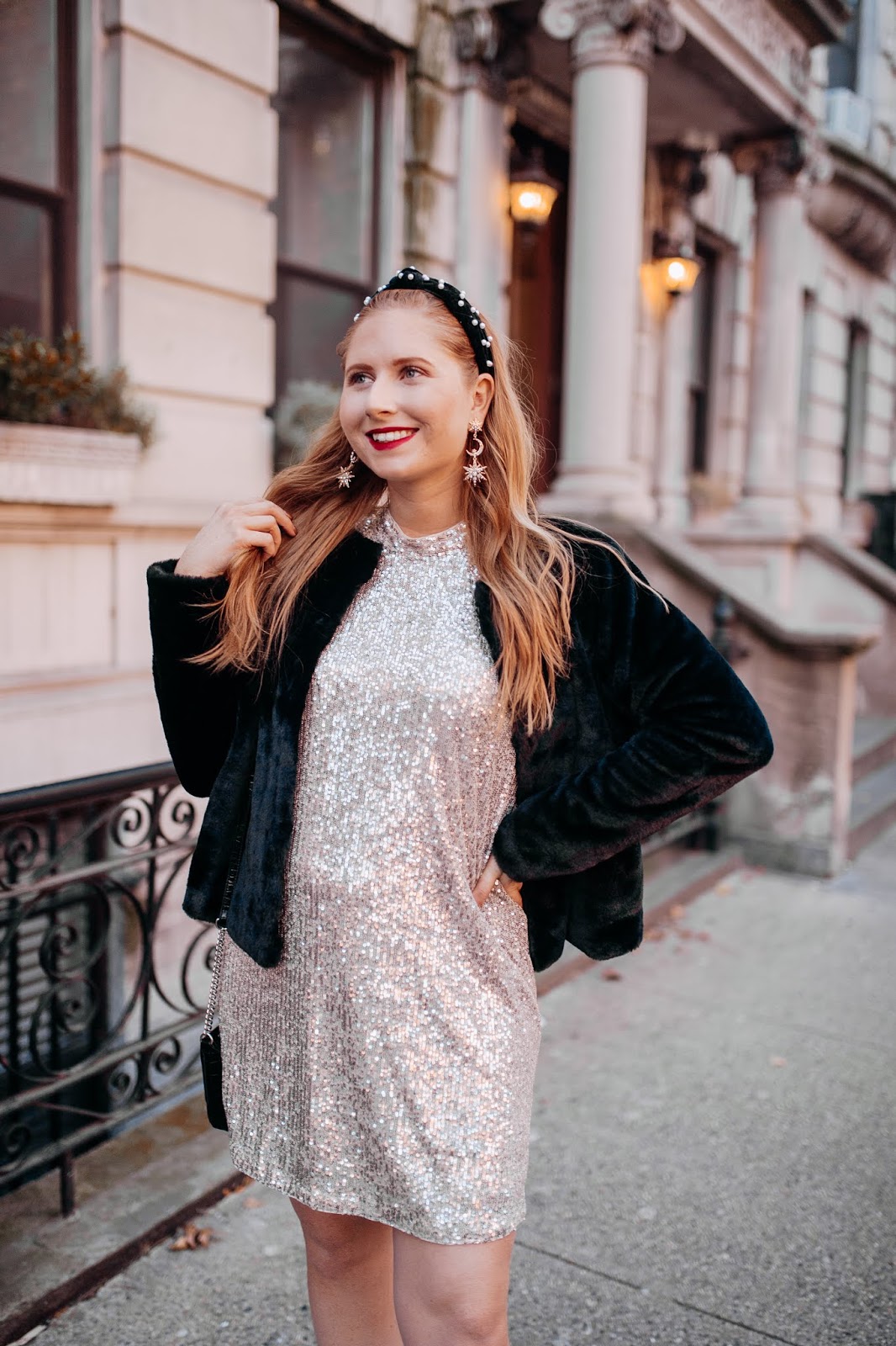 Holiday Party Outfit Ideas - Affordable by Amanda wears a sequined silver dress from H&M in New York City