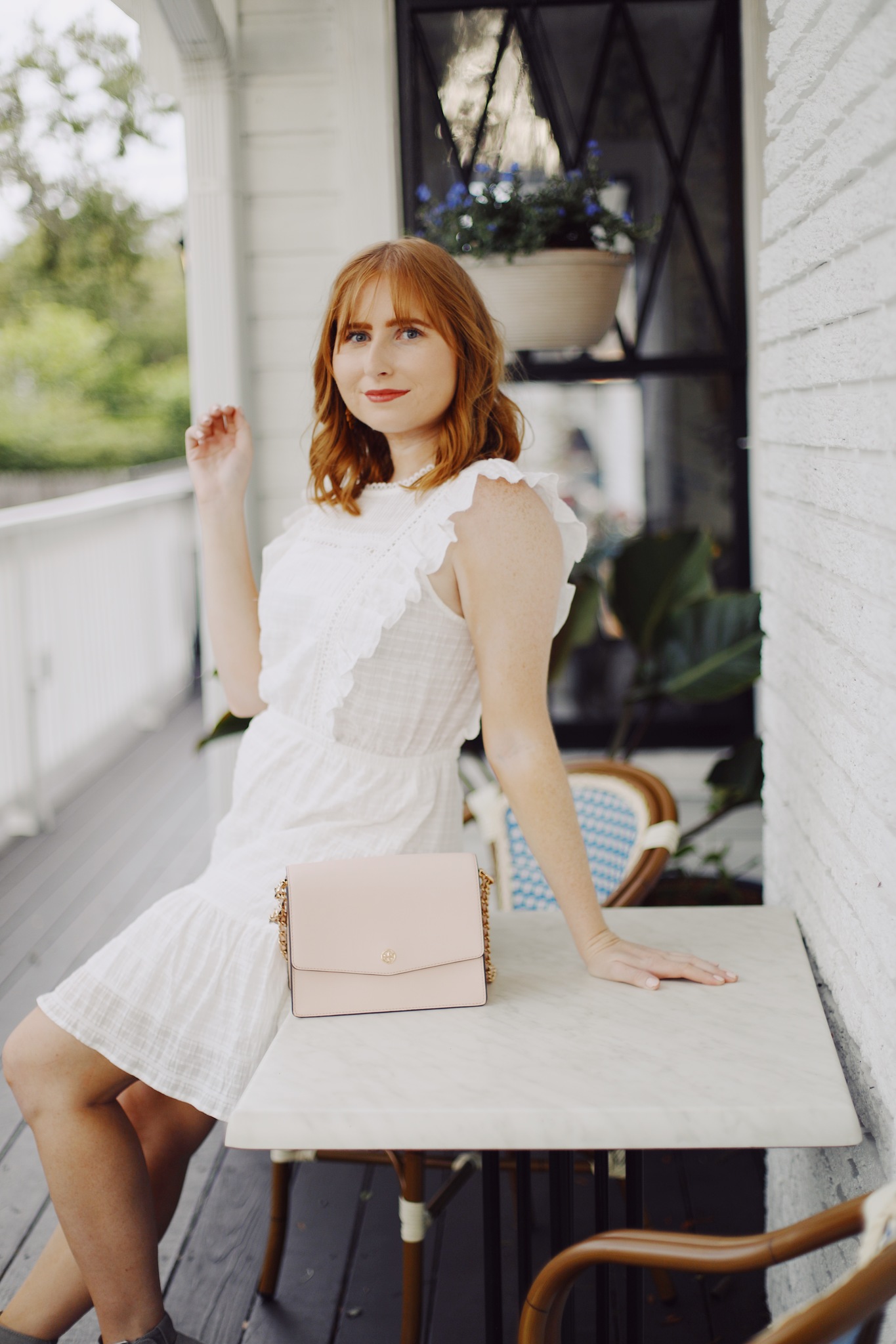 Little White Dress for Summer 2020 | Affordable by Amanda wears Women's Sleeveless Ruffle Apron Front Short Dress - Wild Fable™