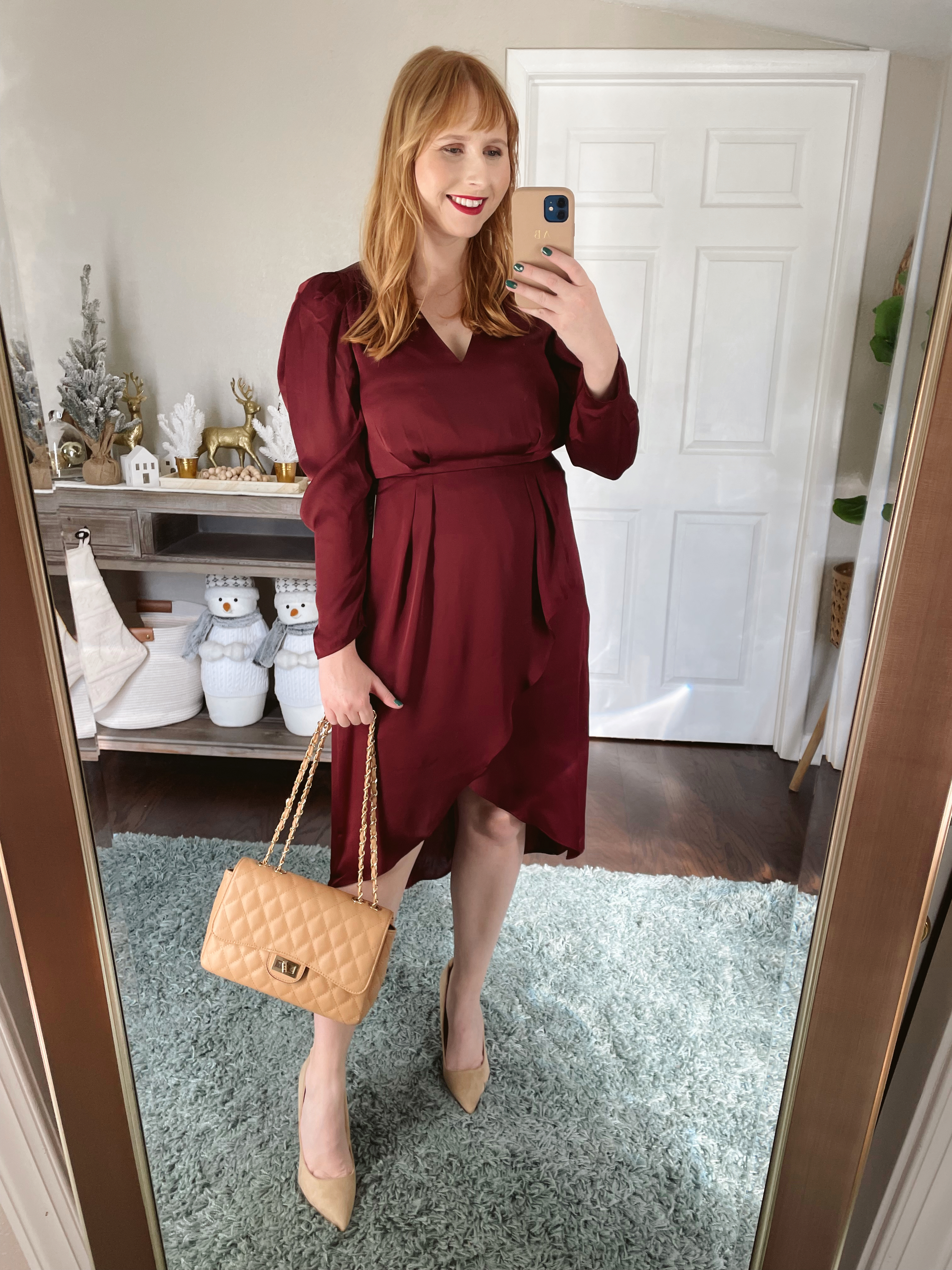 Affordable by Amanda wears a burgundy Satin Puff Shoulder Midi Dress 