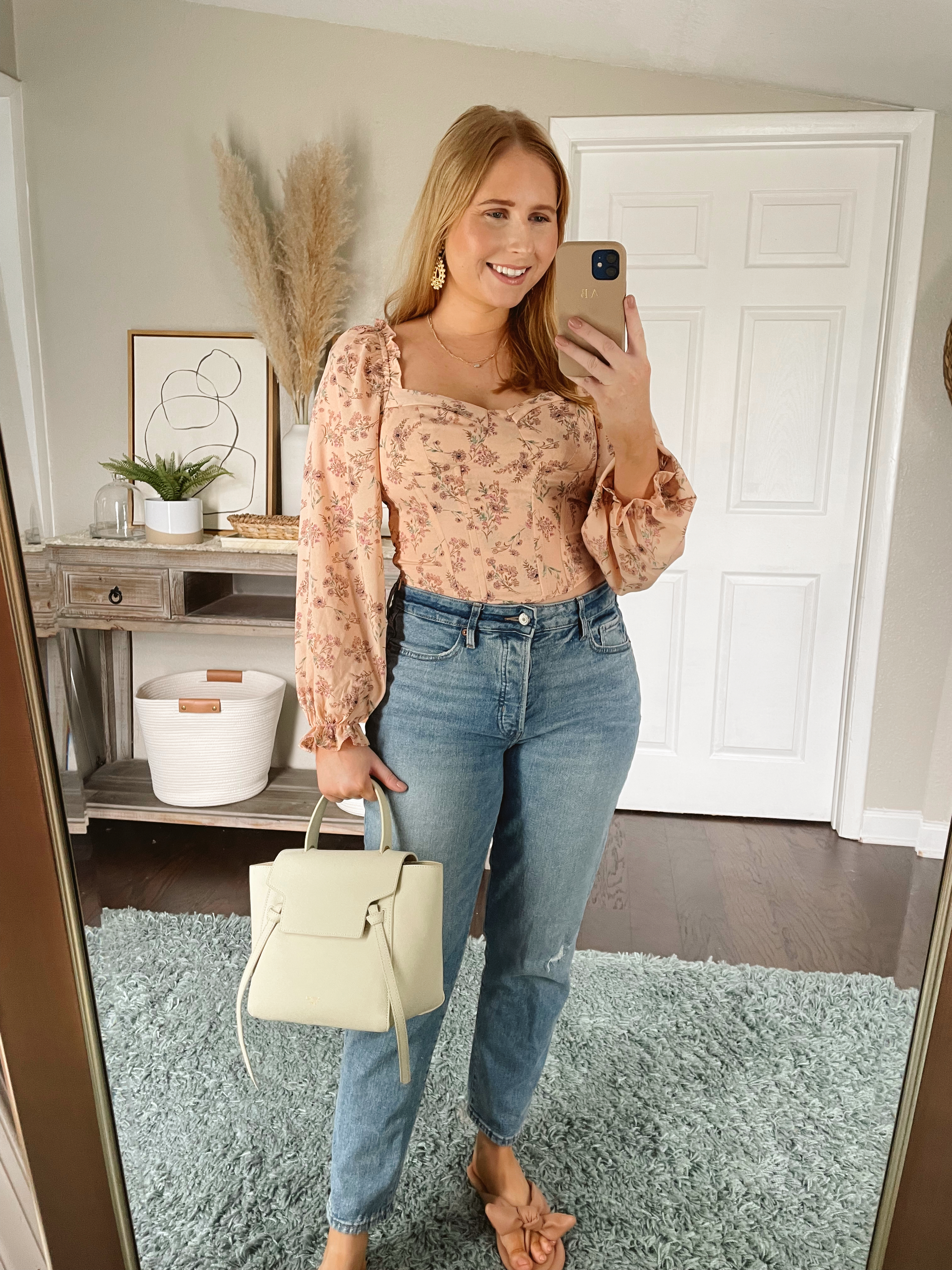 Affordable by Amanda wears ASTR the label peach floral corset top with denim straight leg denim jeans