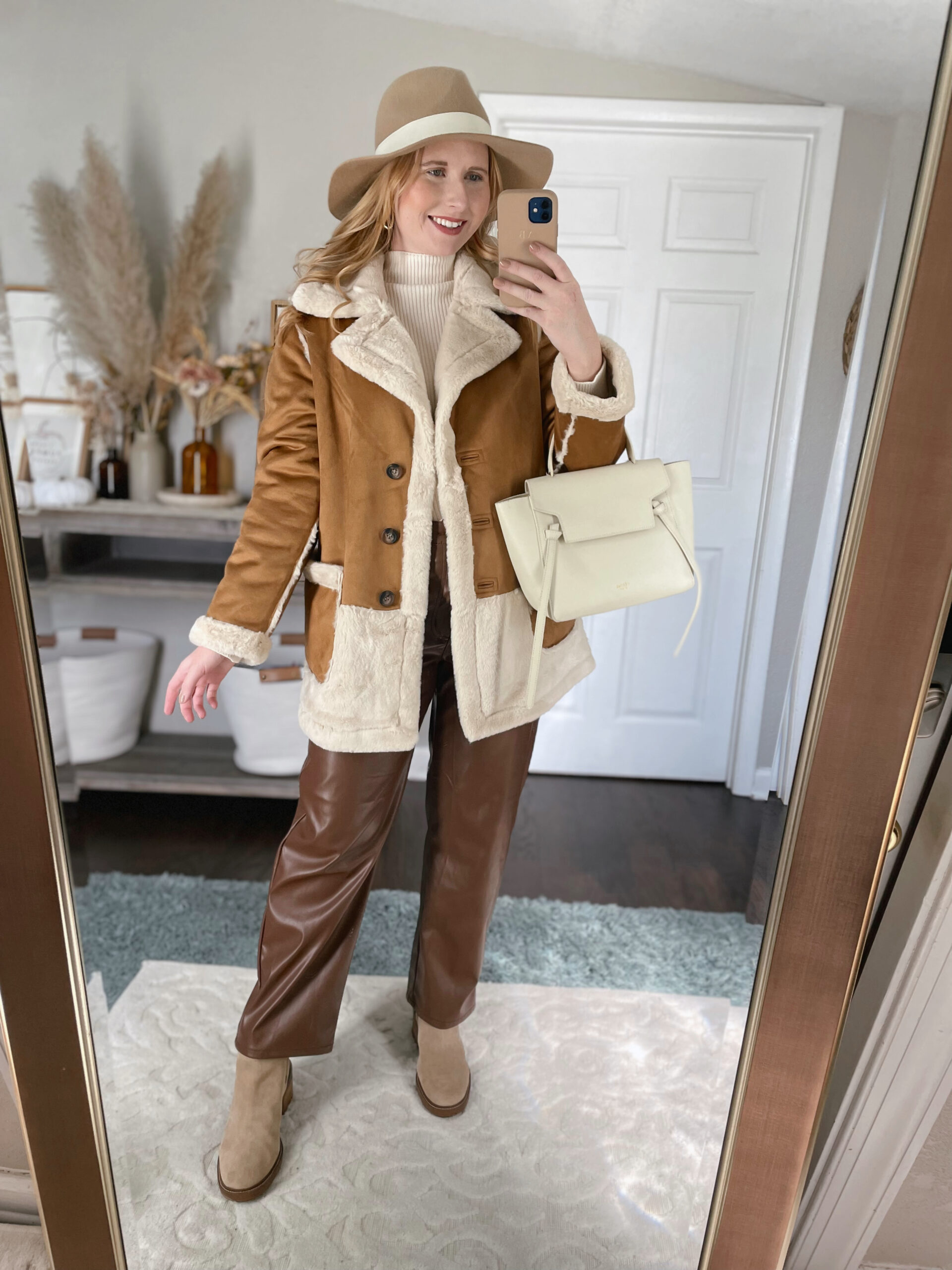 NVLT Reversible Faux Shearling Coat, brown faux leather pants, chelsea boots