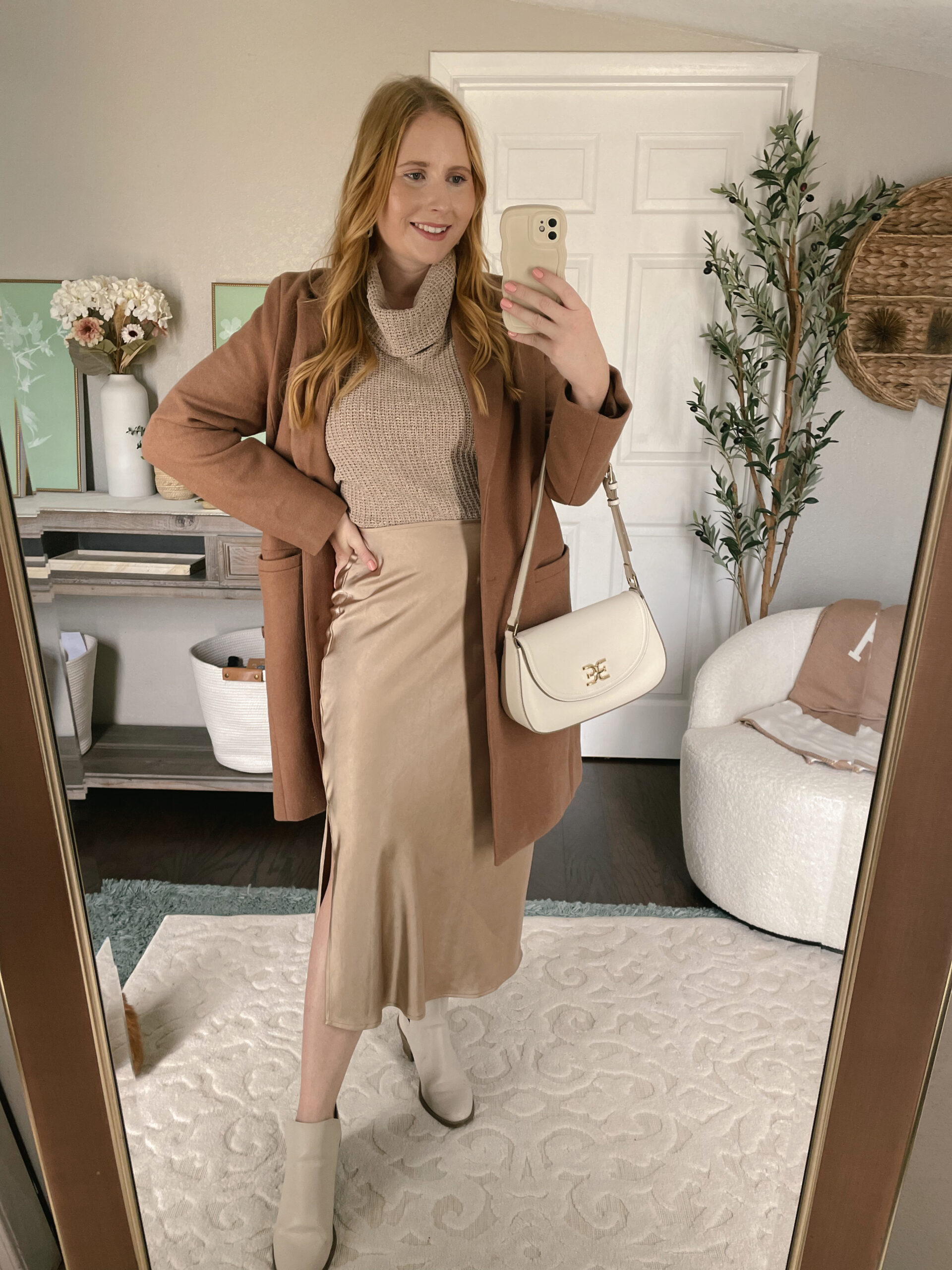 How to Style a Midi Skirt - Fall Outfit Idea with a tan coat, cowl neck sweater, and gold satin midi skirt